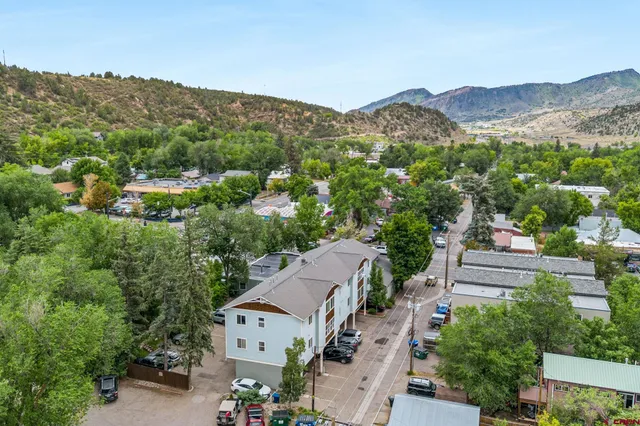 an aerial view of residential house with an outdoor space