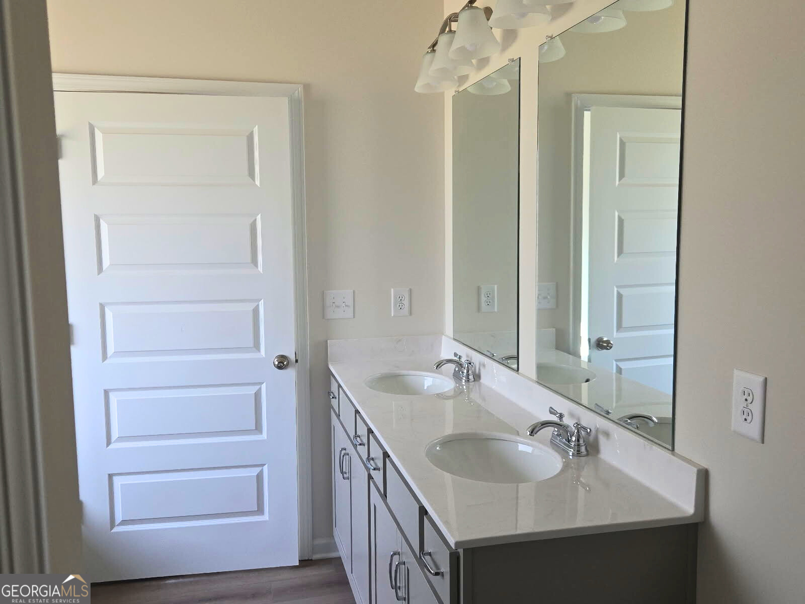 157 Creekside Road, Unit (LOT 32) Eatonton, GA 31024 - Photo 3 of 28 a bathroom with a sink and a mirror