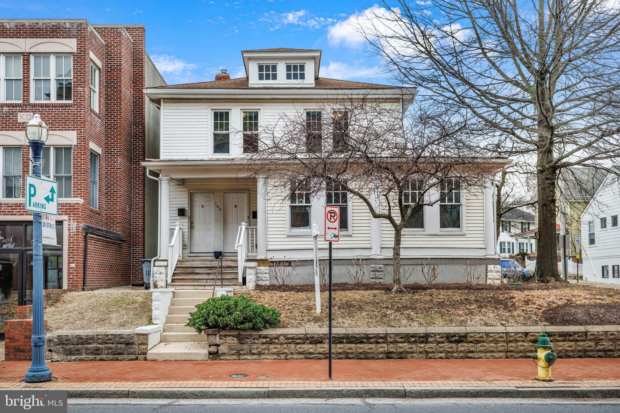 160 West Street Annapolis, MD 21401 - Photo 1 of 34 a front view of a house with garden