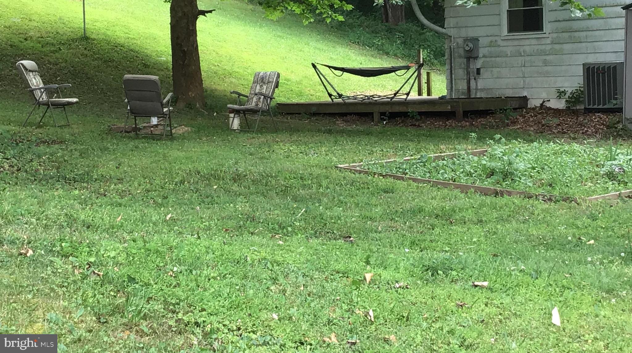 4327 Gross Mill Road Hampstead, MD 21074 - Photo 23 of 27 Sit and Relax in the yard