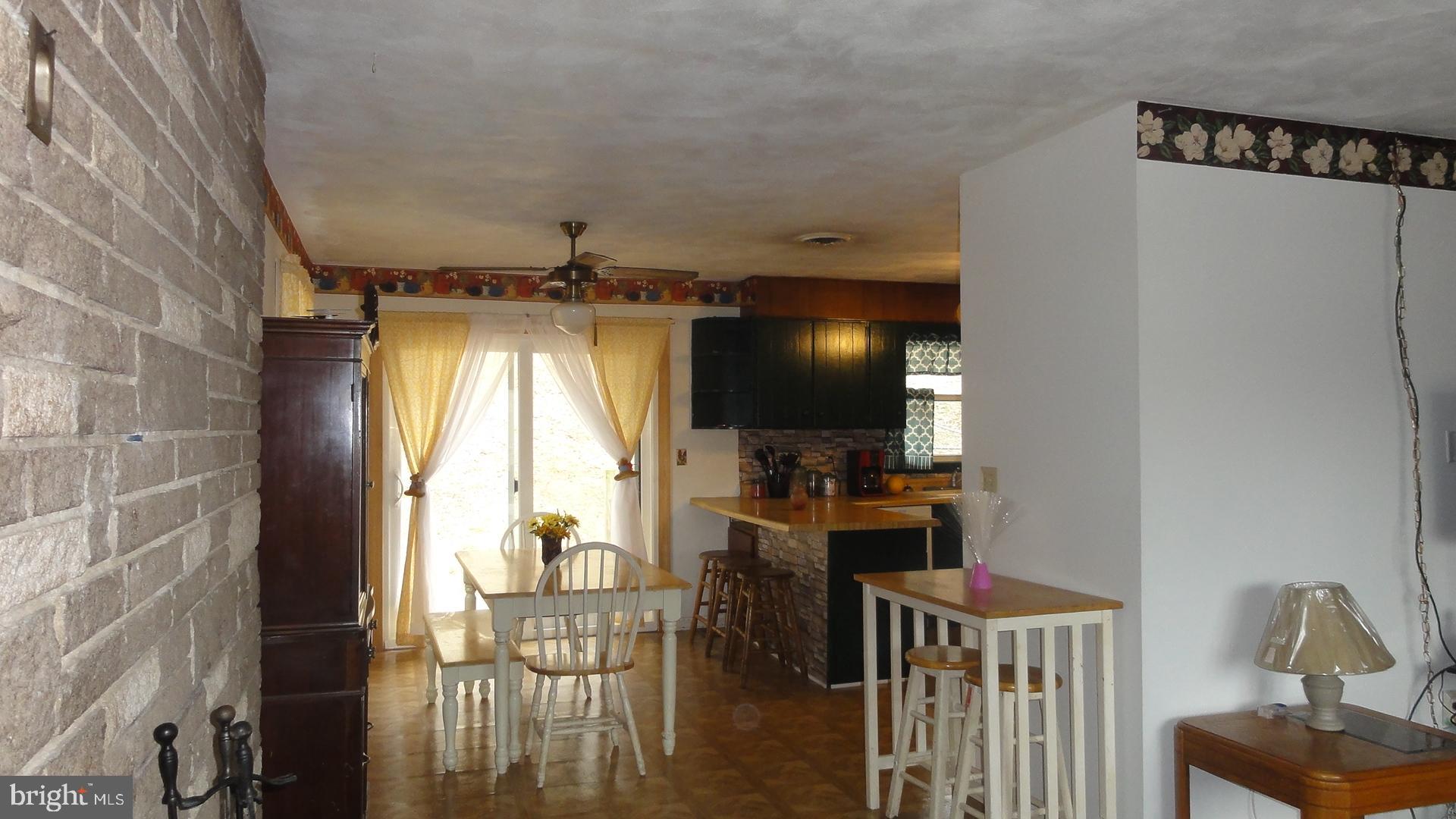 4327 Gross Mill Road Hampstead, MD 21074 - Photo 9 of 27 Living Room flows to Dining Room & Kitchen