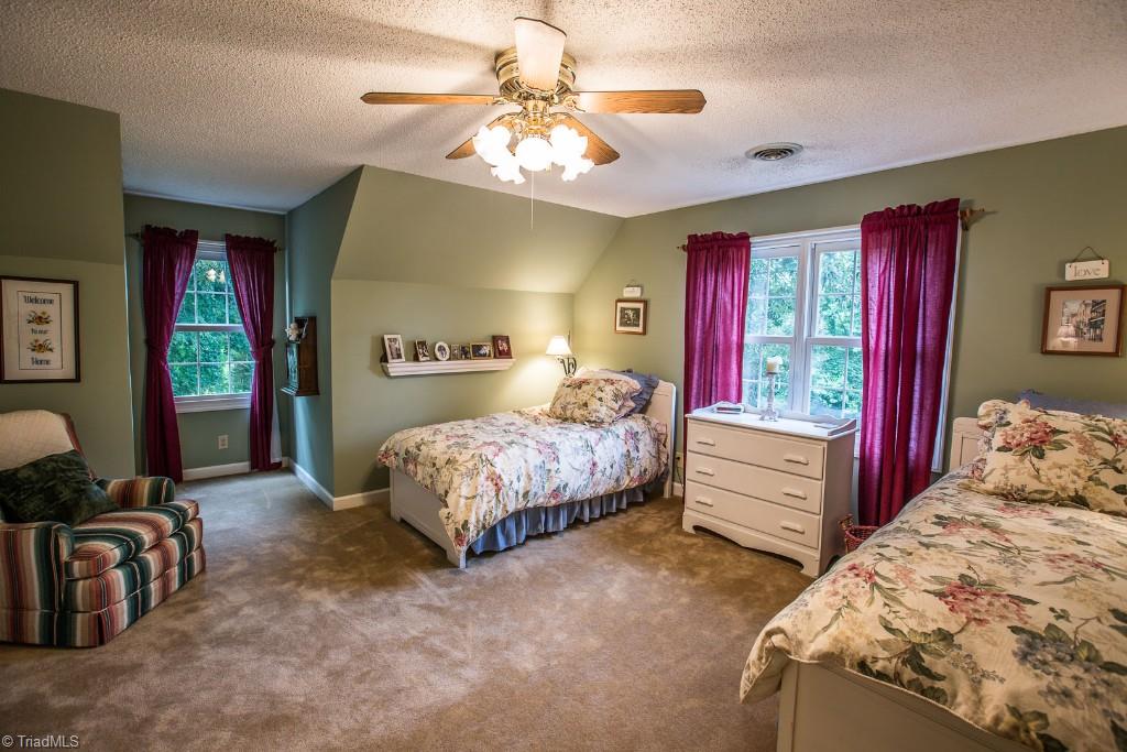 5707 Roundtable Road Greensboro, NC 27407 - Photo 15 of 29 All bedrooms are spacious. Ceiling-light.