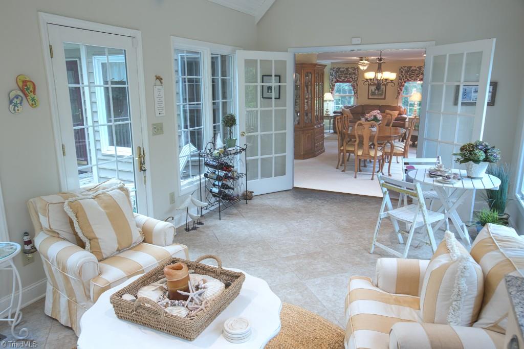 5707 Roundtable Road Greensboro, NC 27407 - Photo 3 of 29 Glass french doors can be closed to rest of the house.