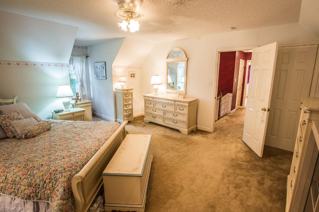 5707 Roundtable Road Greensboro, NC 27407 - Photo 20 of 29 Large closet, eaves storage, ceiling fan-light.