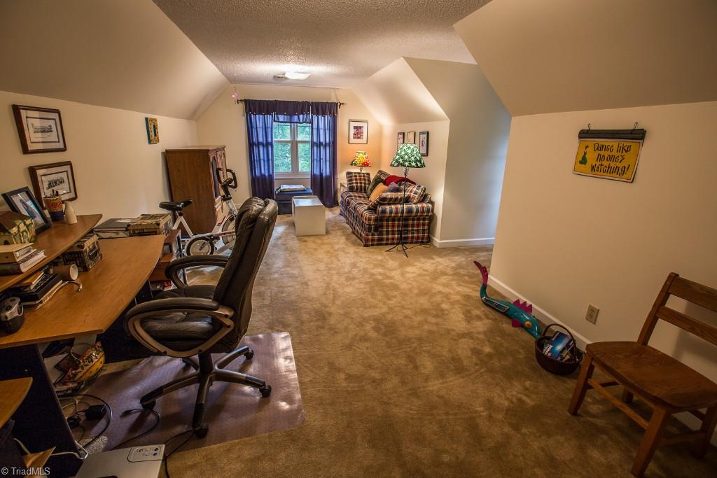 5707 Roundtable Road Greensboro, NC 27407 - Photo 21 of 29 Huge fourth bedroom or Bonus Room is 23'6"x 12'.