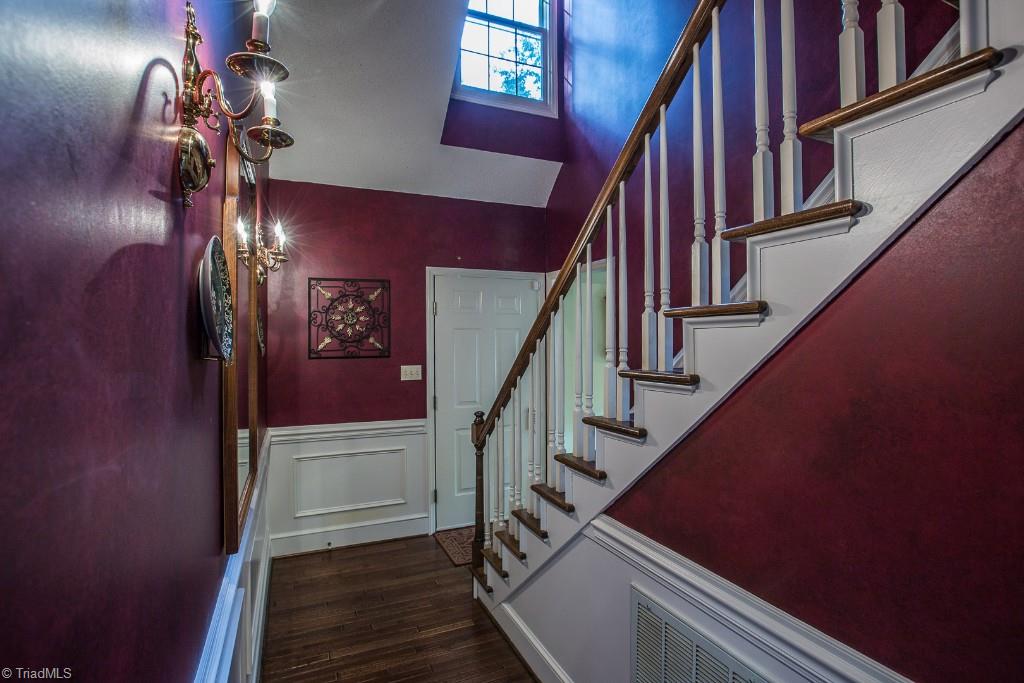 5707 Roundtable Road Greensboro, NC 27407 - Photo 5 of 29 Foyer with natural light. Enters into Great Room on one side and Master Bedroom and Kitchen on other side.