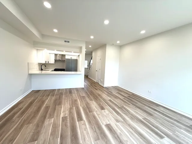 a view of kitchen and sink