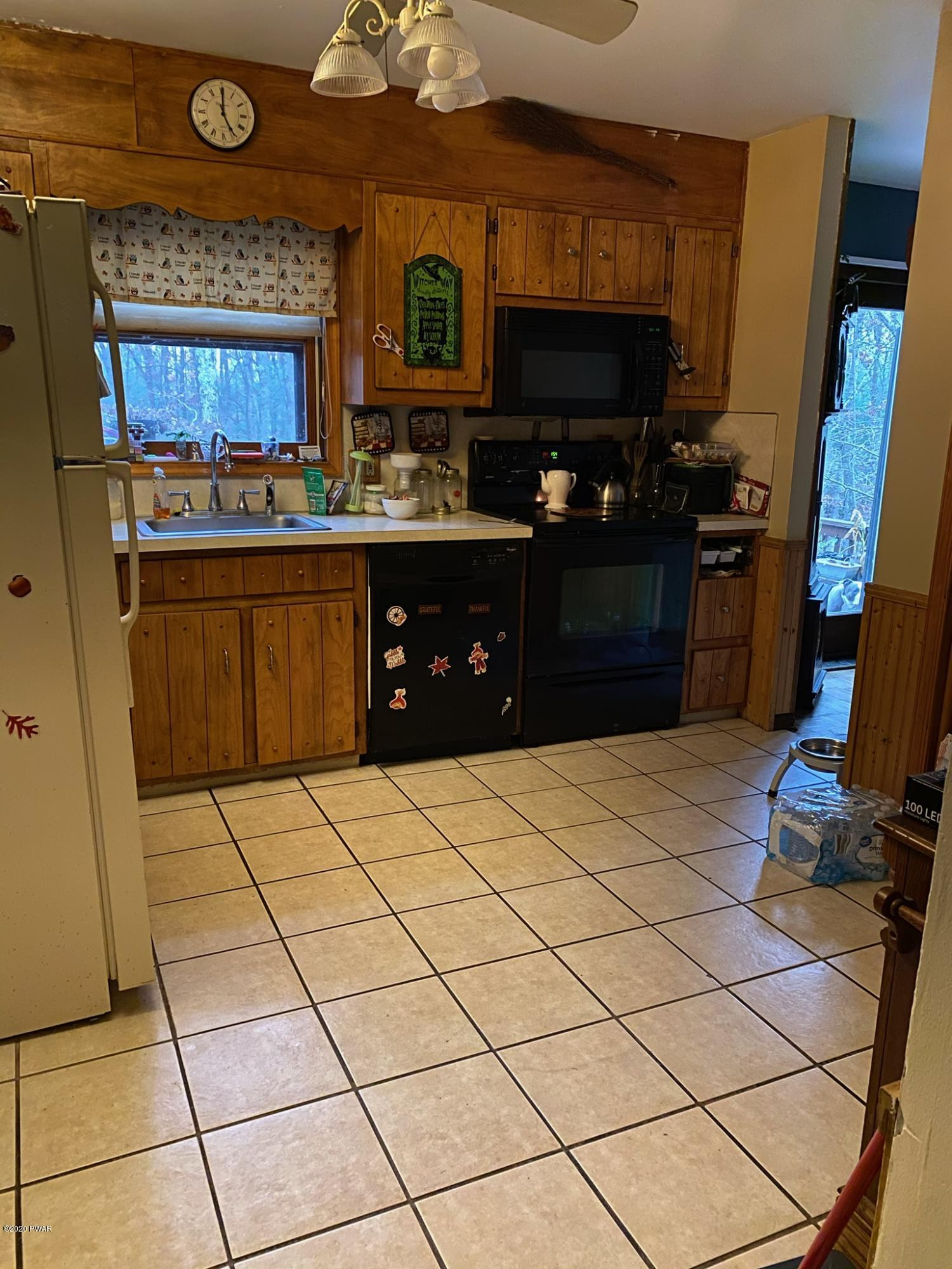 179 Butternut Road Milford, PA 18337 - Photo 3 of 39 a kitchen with stainless steel appliances a sink stove and cabinets