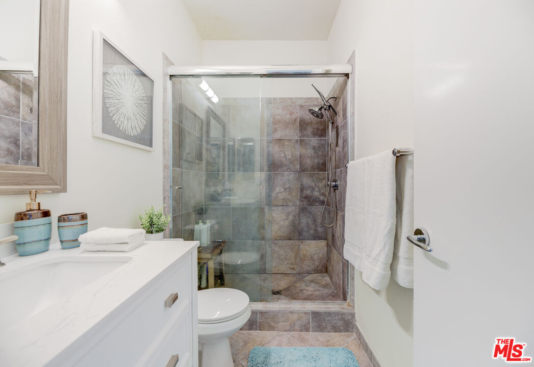 1 Northstar Street, Unit 103 Marina del Rey, CA 90292 - Photo 9 of 18 a bathroom with a sink toilet and shower
