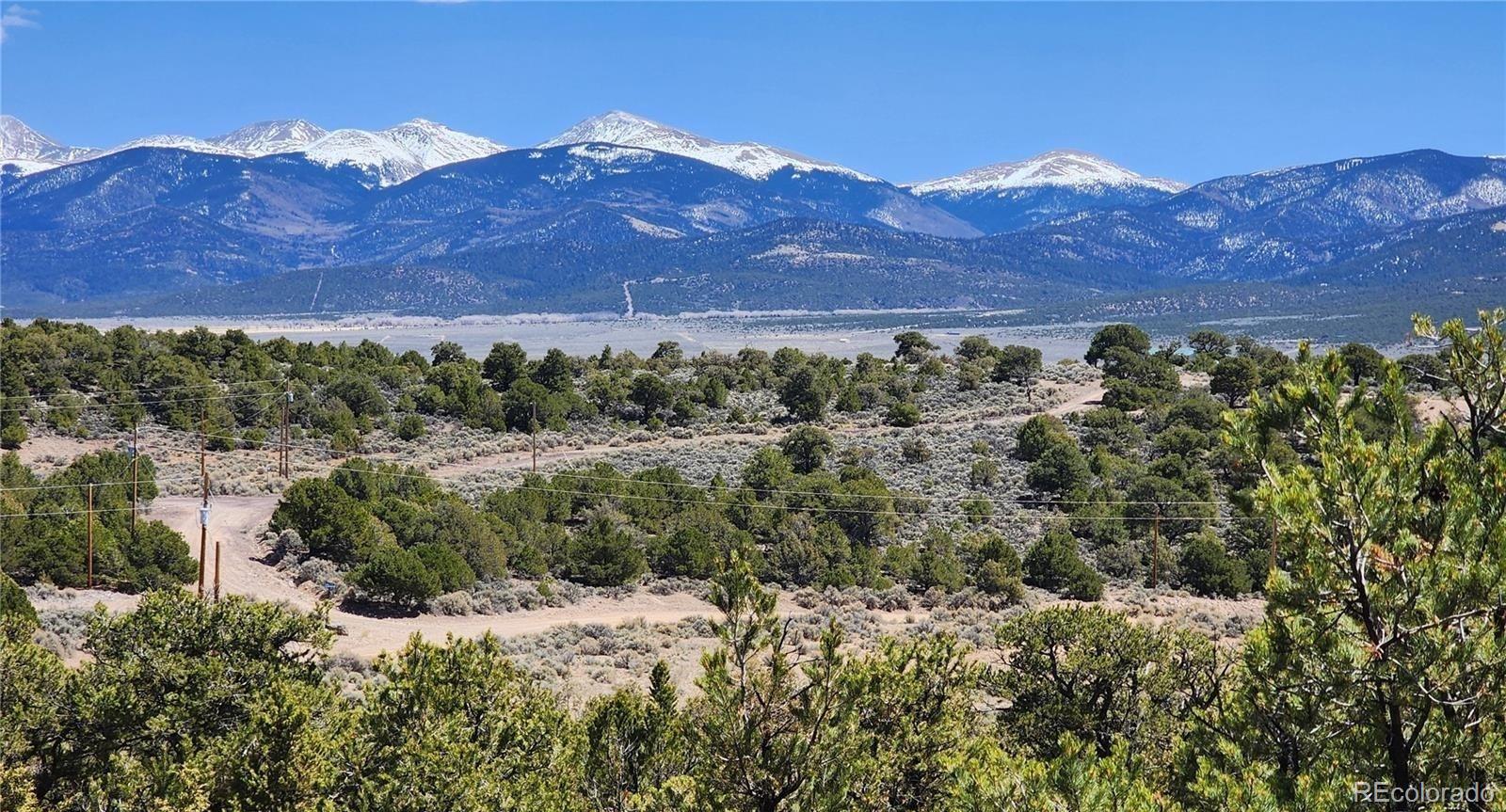 Lot 48 Erin The Red Road San Luis, CO 81152 - Photo 3 of 6 a view of a forest with mountains in the background