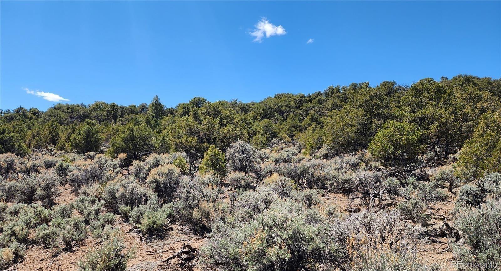 Lot 48 Erin The Red Road San Luis, CO 81152 - Photo 5 of 6 a view of a building in a field