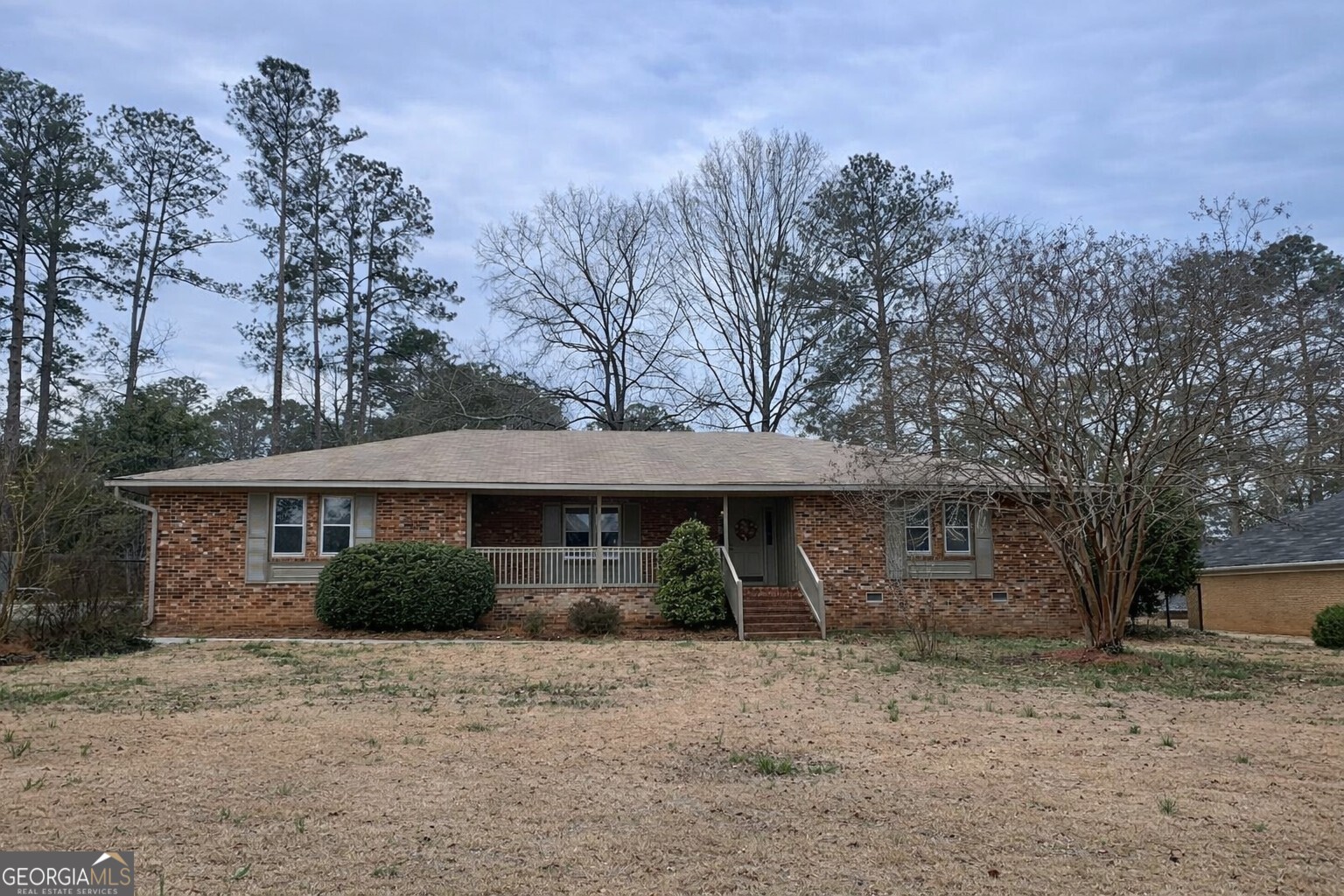 615 Hemlock Drive Thomson, GA 30824 - Photo 1 of 32 a front view of a house with a yard