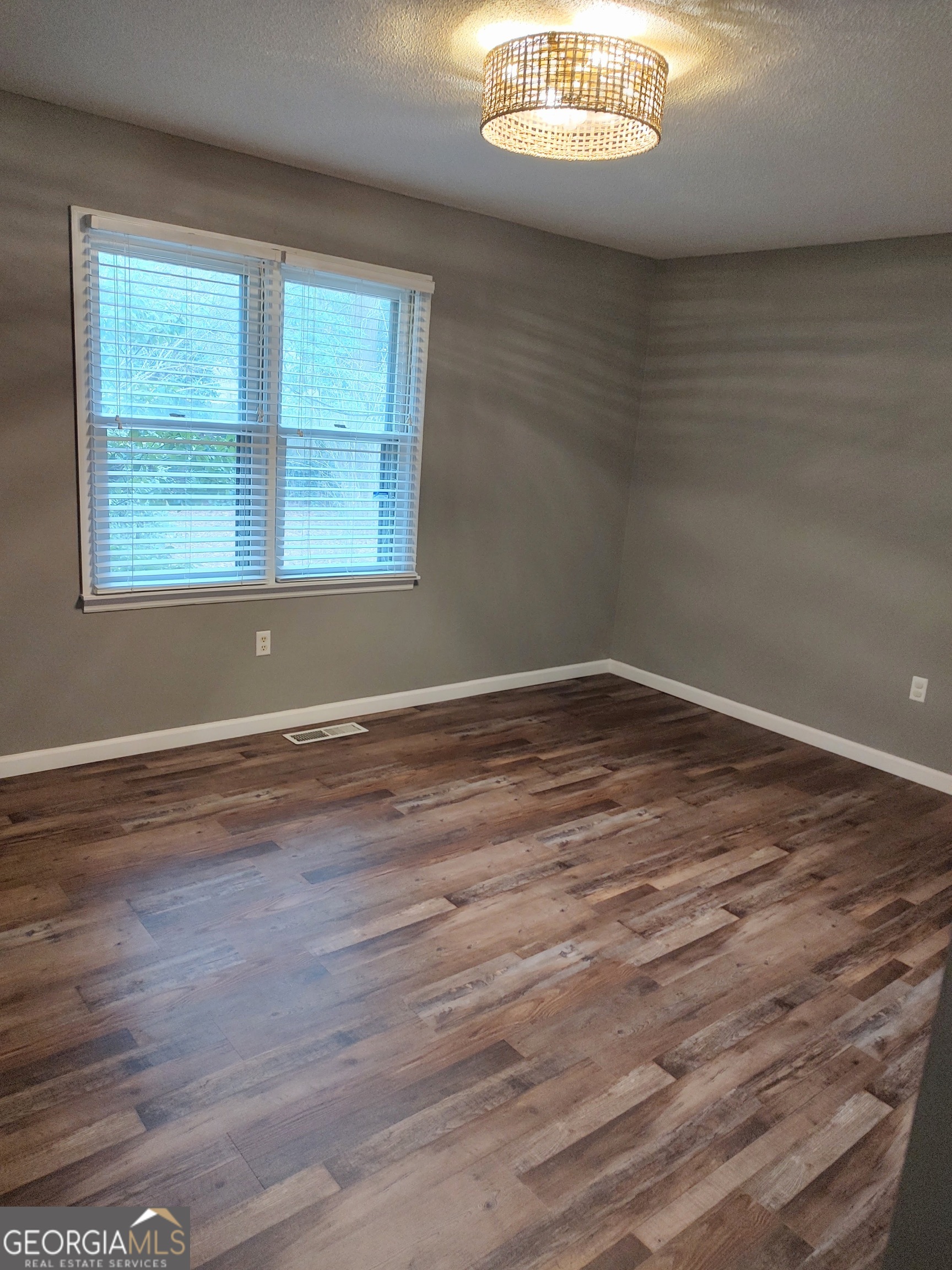 615 Hemlock Drive Thomson, GA 30824 - Photo 22 of 32 a view of empty room with window