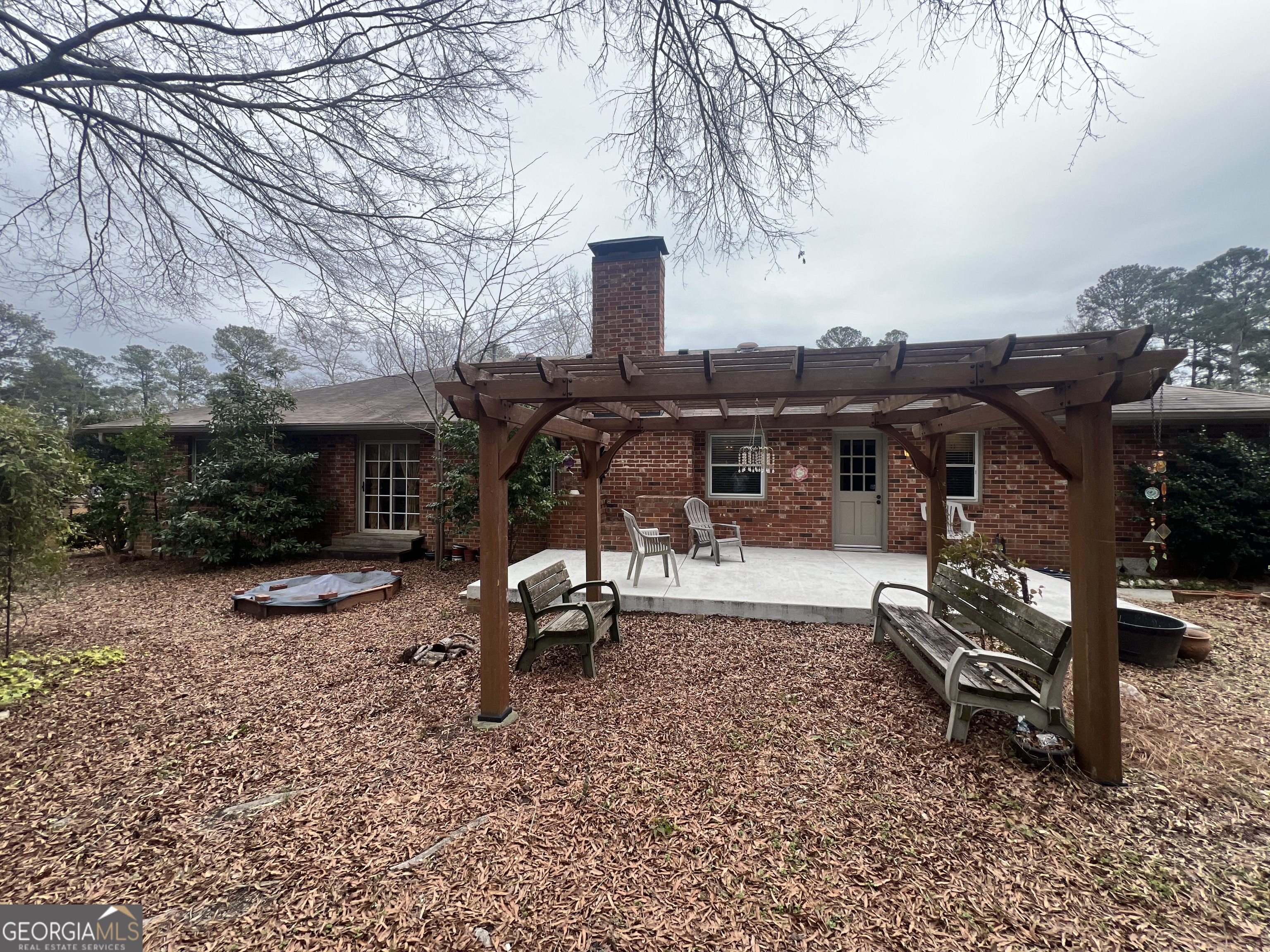 615 Hemlock Drive Thomson, GA 30824 - Photo 28 of 32 a view of a house with backyard and sitting area