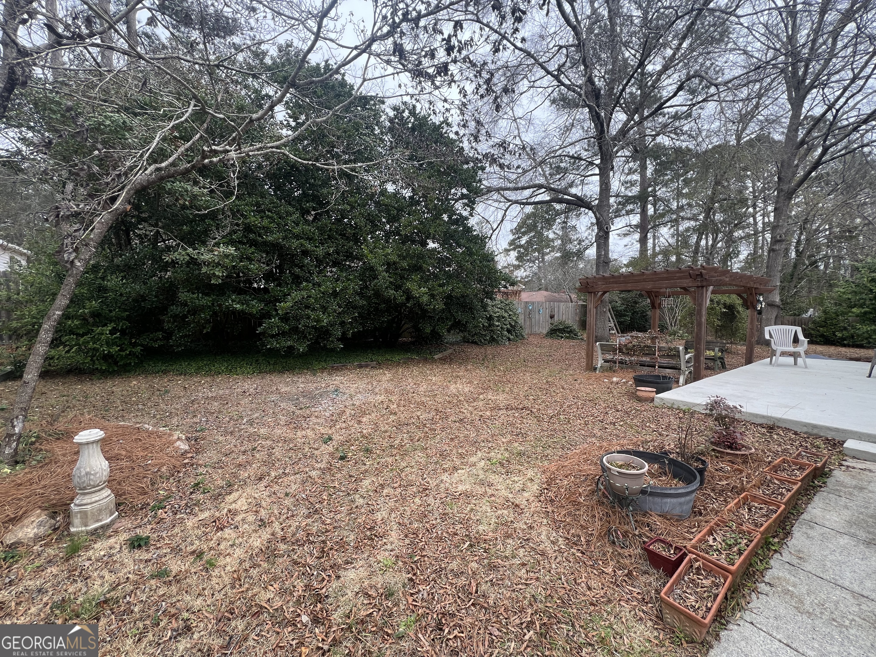 615 Hemlock Drive Thomson, GA 30824 - Photo 31 of 32 a view of a backyard with sitting area