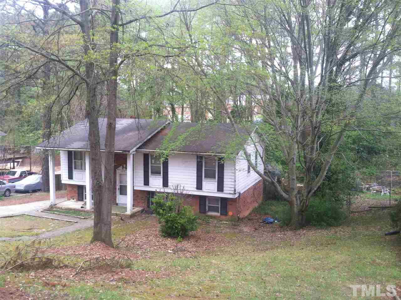 2217 Foxtrot Road Raleigh, NC 27610 - Photo 1 of 2 front view of a house with a yard