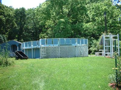 7525 Hahn Road Bangor, PA 18013 - Photo 6 of 10 a view of a deck with a small yard and large trees