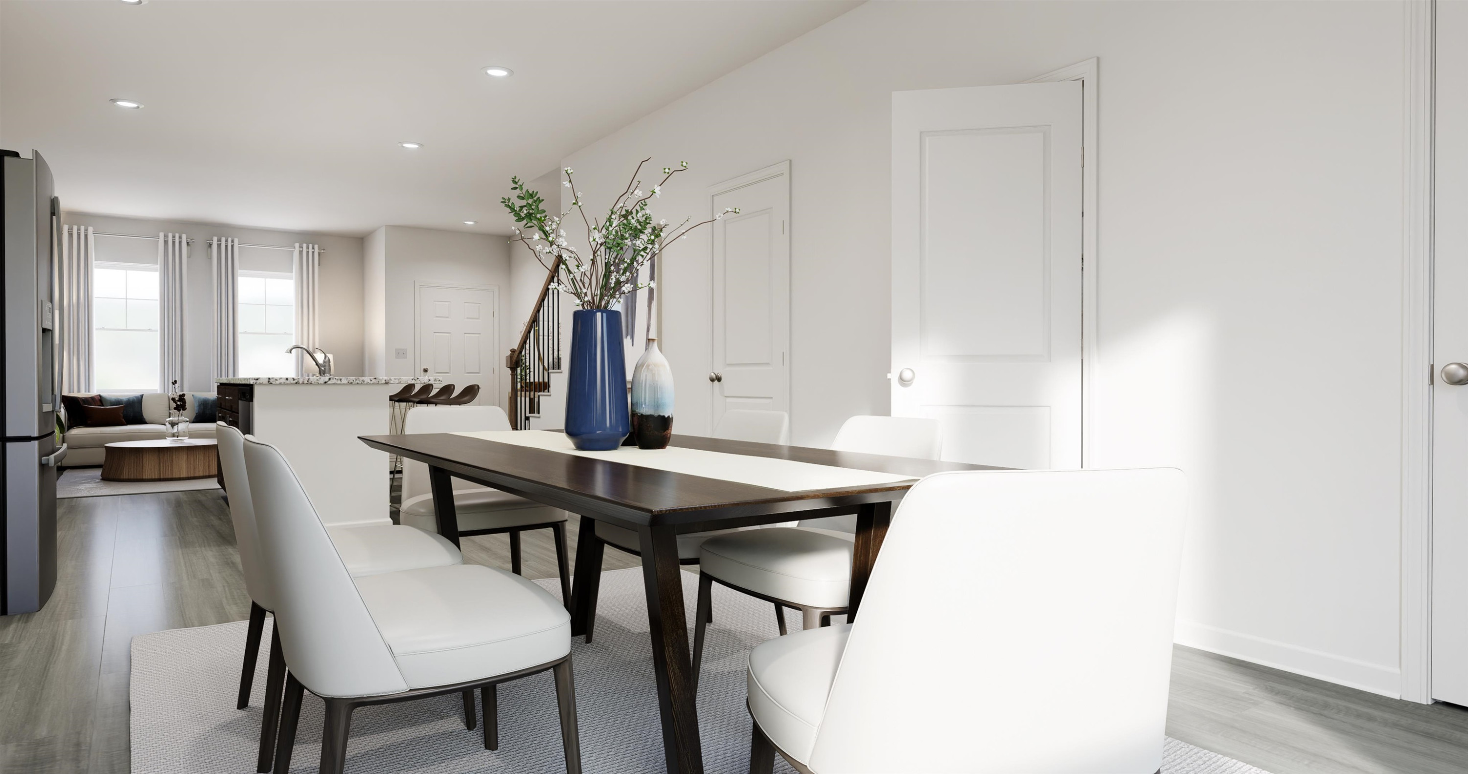 5019 Microcline Trail, Unit 813 MEREDITH B Raleigh, NC 27610 - Photo 3 of 16 a view of a livingroom with furniture and a potted plant