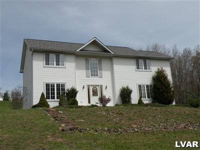 1671 Astolat Road Effort, PA 18330 - Photo 1 of 4 front view of a house with a yard