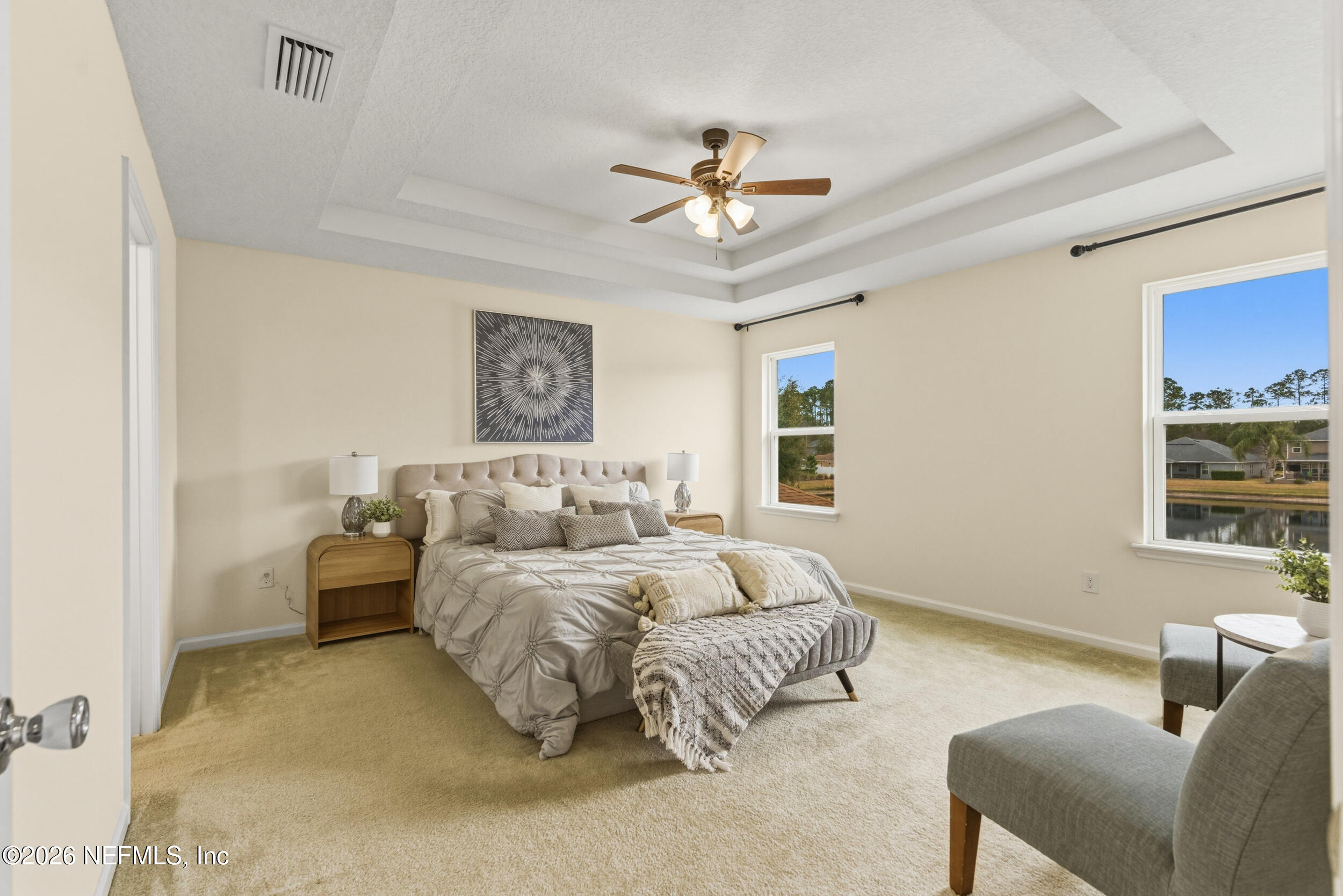 270 Carnation Street St. Johns, FL 32259 - Photo 25 of 56 a bedroom with a large bed and a couch