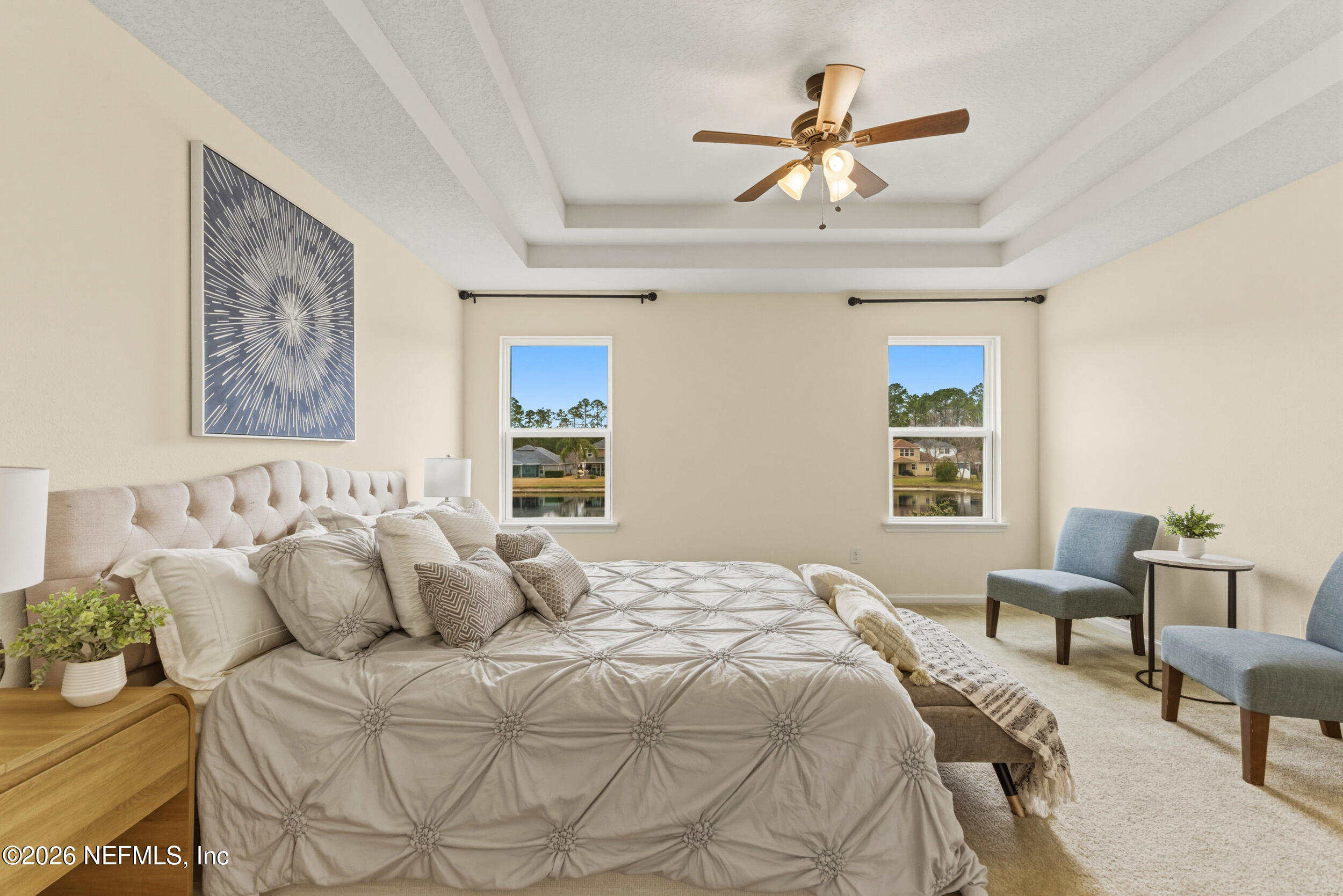 270 Carnation Street St. Johns, FL 32259 - Photo 26 of 56 a bedroom with a bed and a couch