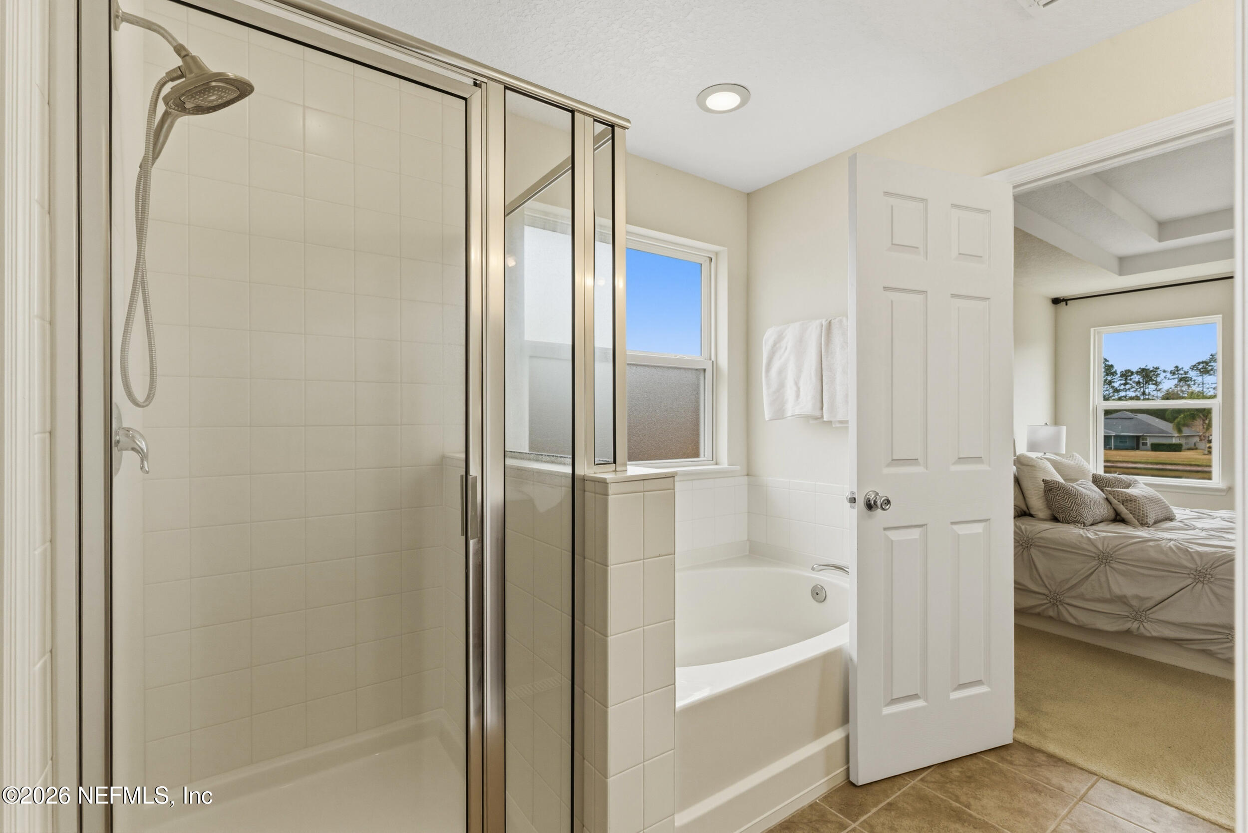 270 Carnation Street St. Johns, FL 32259 - Photo 28 of 56 a bathroom with a bathtub and a shower