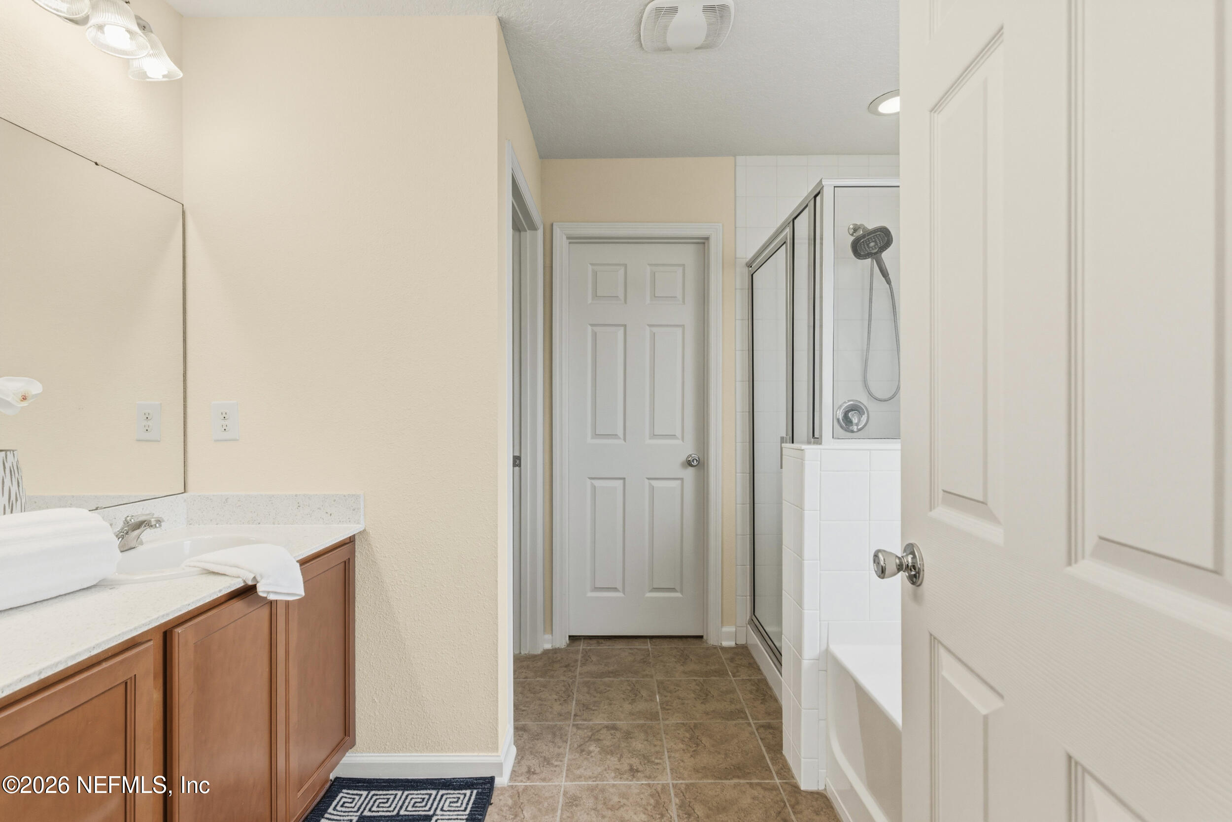 270 Carnation Street St. Johns, FL 32259 - Photo 29 of 56 a bathroom with a sink and a mirror