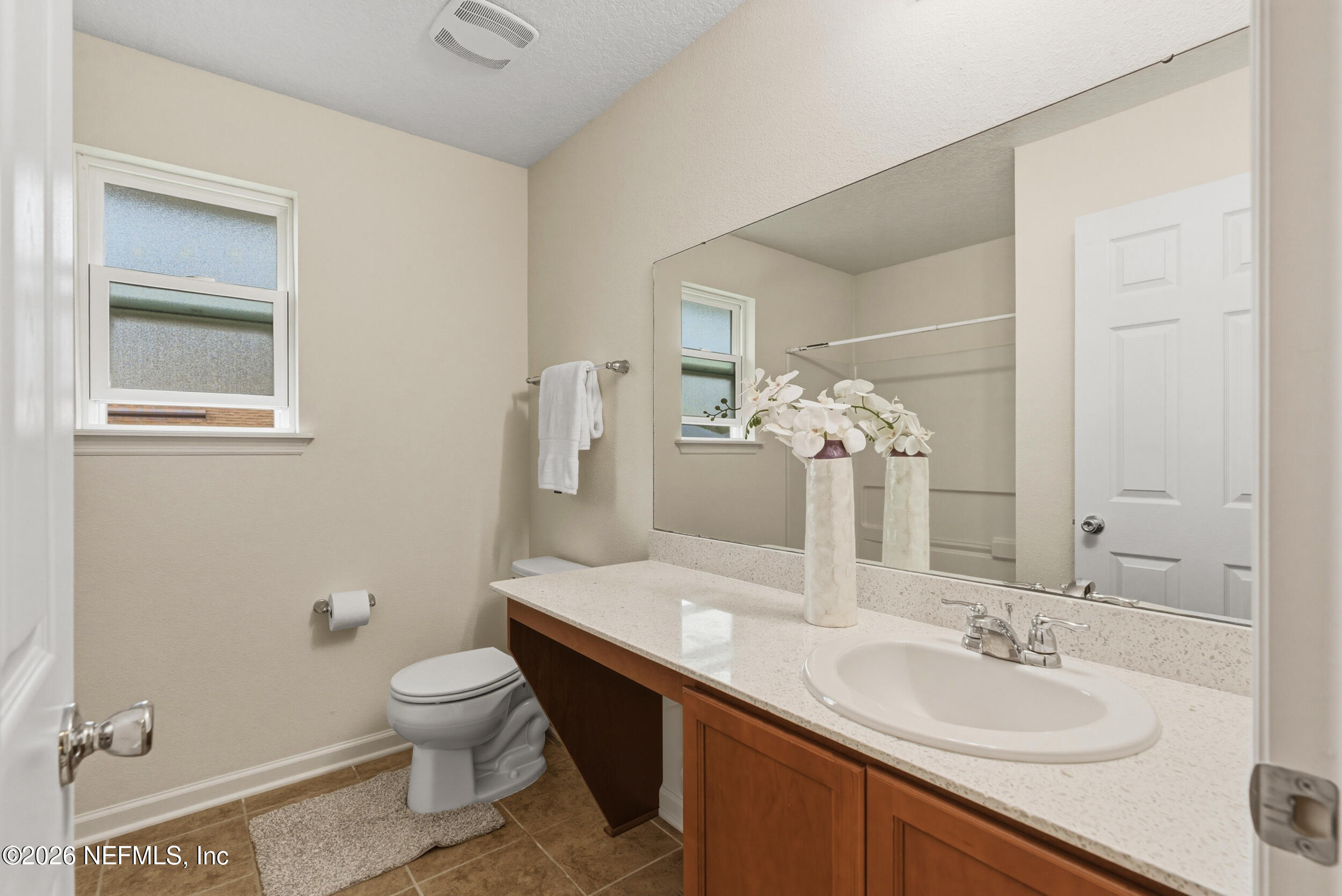 270 Carnation Street St. Johns, FL 32259 - Photo 32 of 56 a bathroom with a sink a toilet and shower