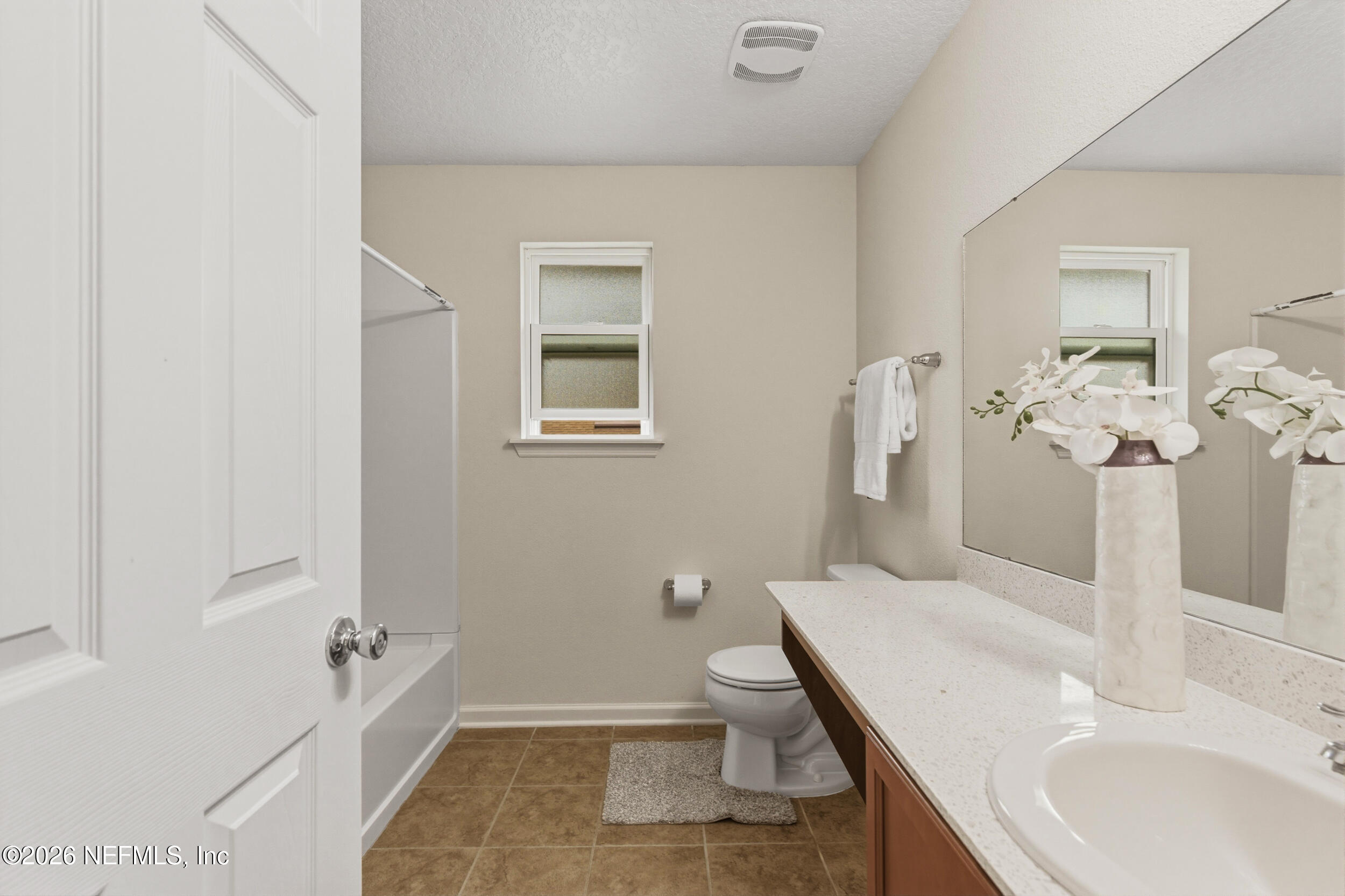 270 Carnation Street St. Johns, FL 32259 - Photo 33 of 56 a bathroom with a sink a toilet and shower