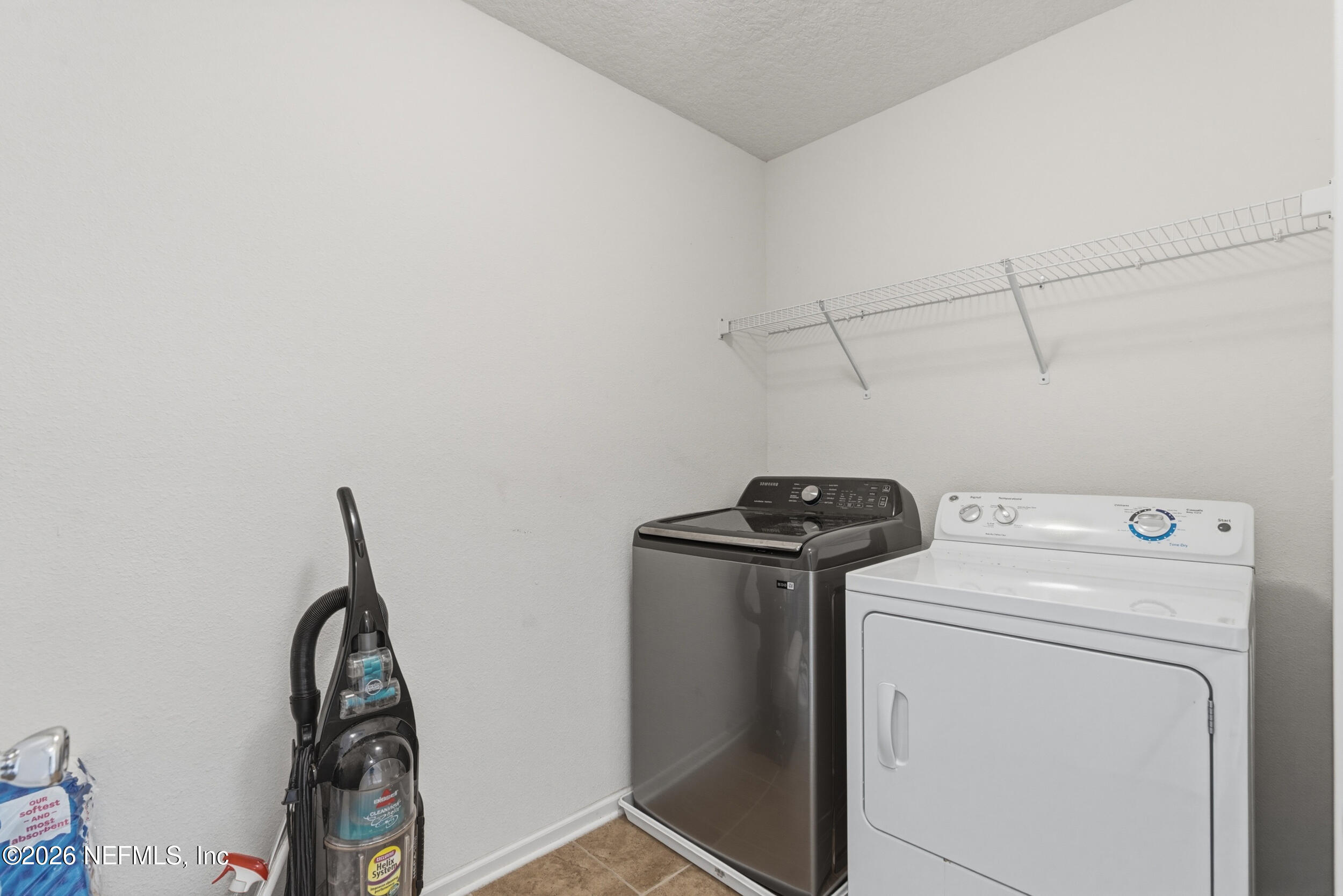 270 Carnation Street St. Johns, FL 32259 - Photo 39 of 56 a utility room with dryer and washer