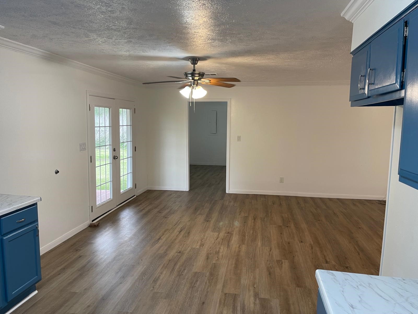 335 Carroll Road Richmond, TX 77469 - Photo 12 of 25 wooden floor in an empty room with a window