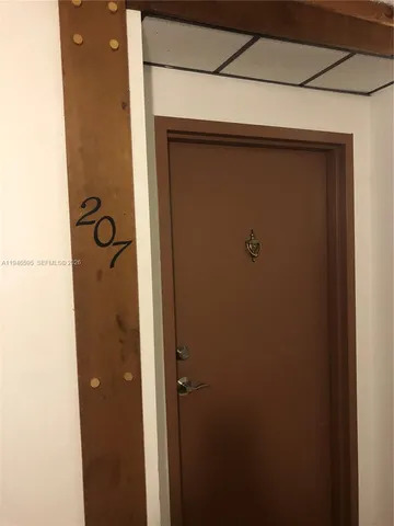 a bathroom with a glass door