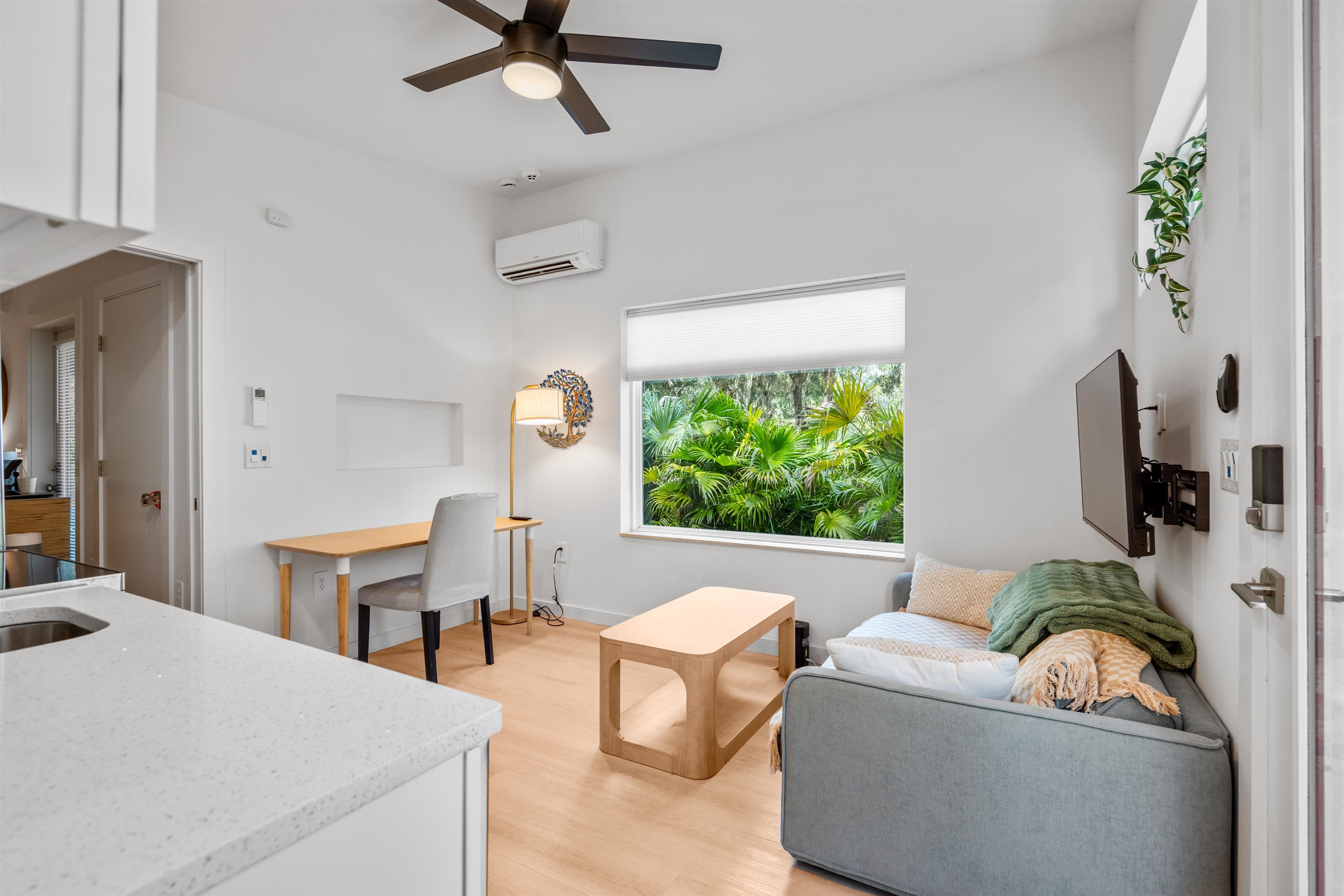 156 North St Johns Street St. Augustine, FL 32084 - Photo 7 of 14 a living room with furniture and a window
