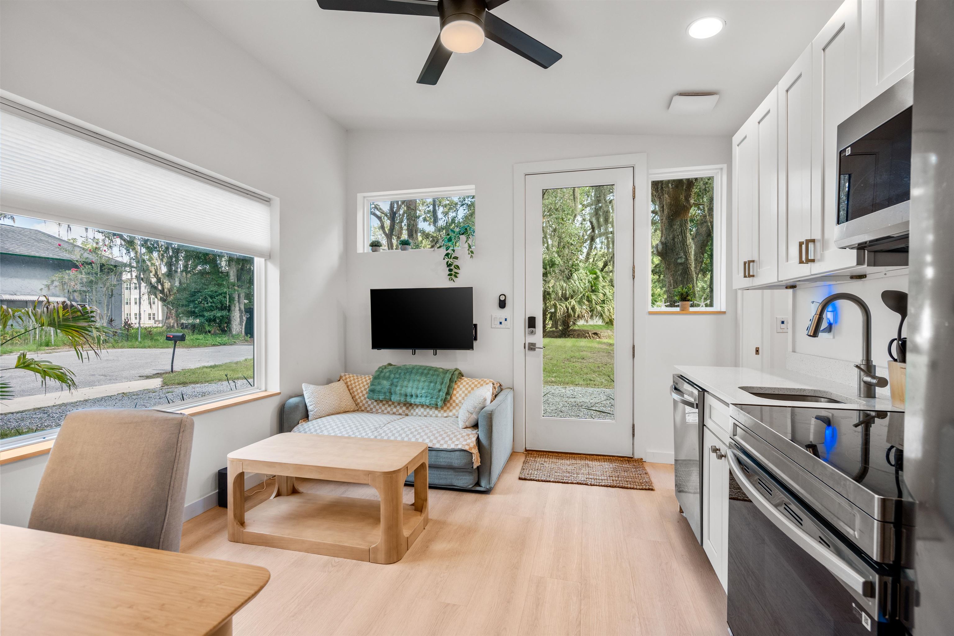156 North St Johns Street St. Augustine, FL 32084 - Photo 8 of 14 a living room with furniture and a flat screen tv