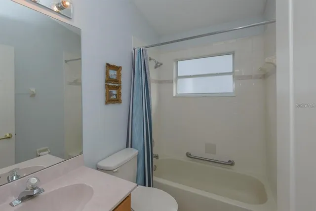 a bathroom with a sink and a bathtub