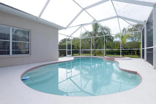 a view of outdoor space with swimming pool