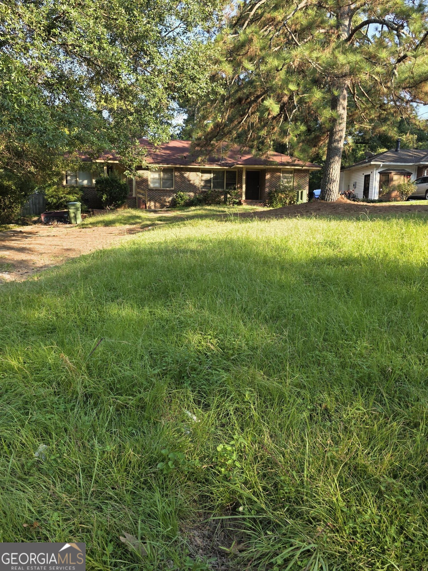 1172 Fayetteville Road Southeast, Unit A & B Atlanta, GA 30316 - Photo 2 of 10 a view of swimming pool with outdoor seating and trees
