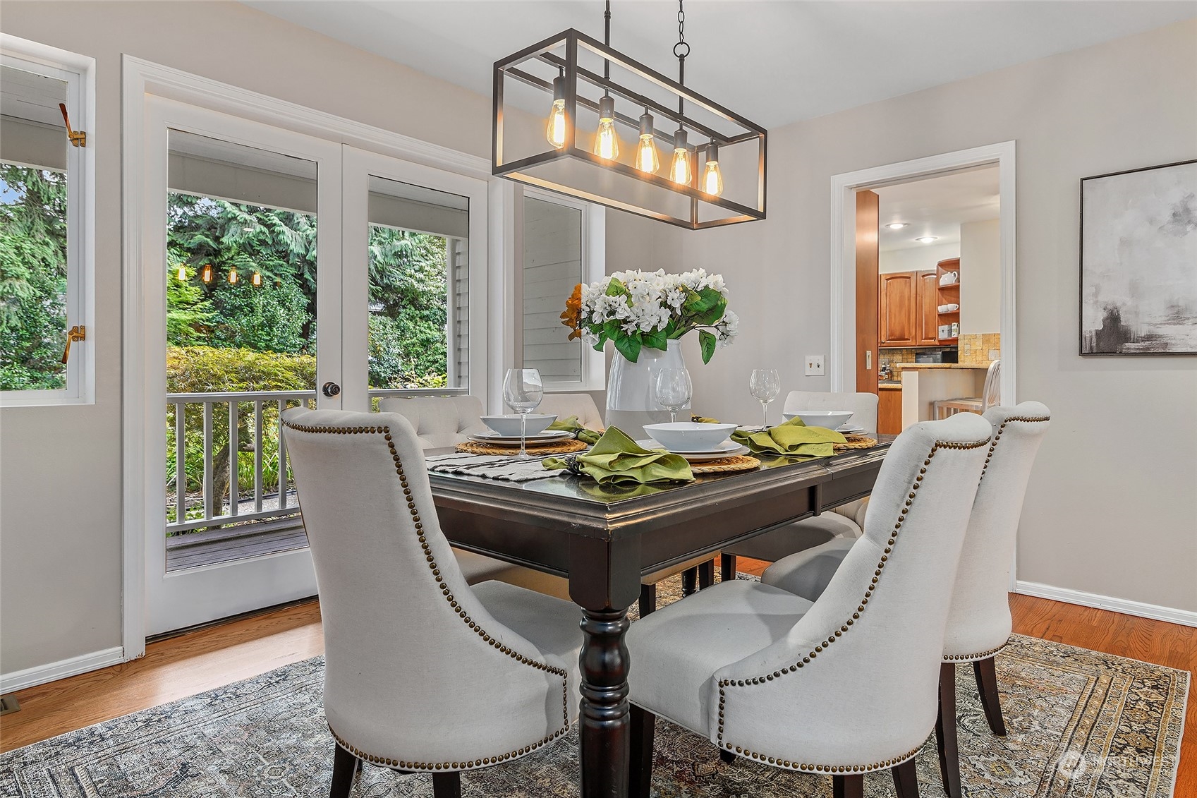 16910 3rd Avenue Southeast Bothell, WA 98012 - Photo 15 of 40 a view of a dining room with furniture window and wooden floor
