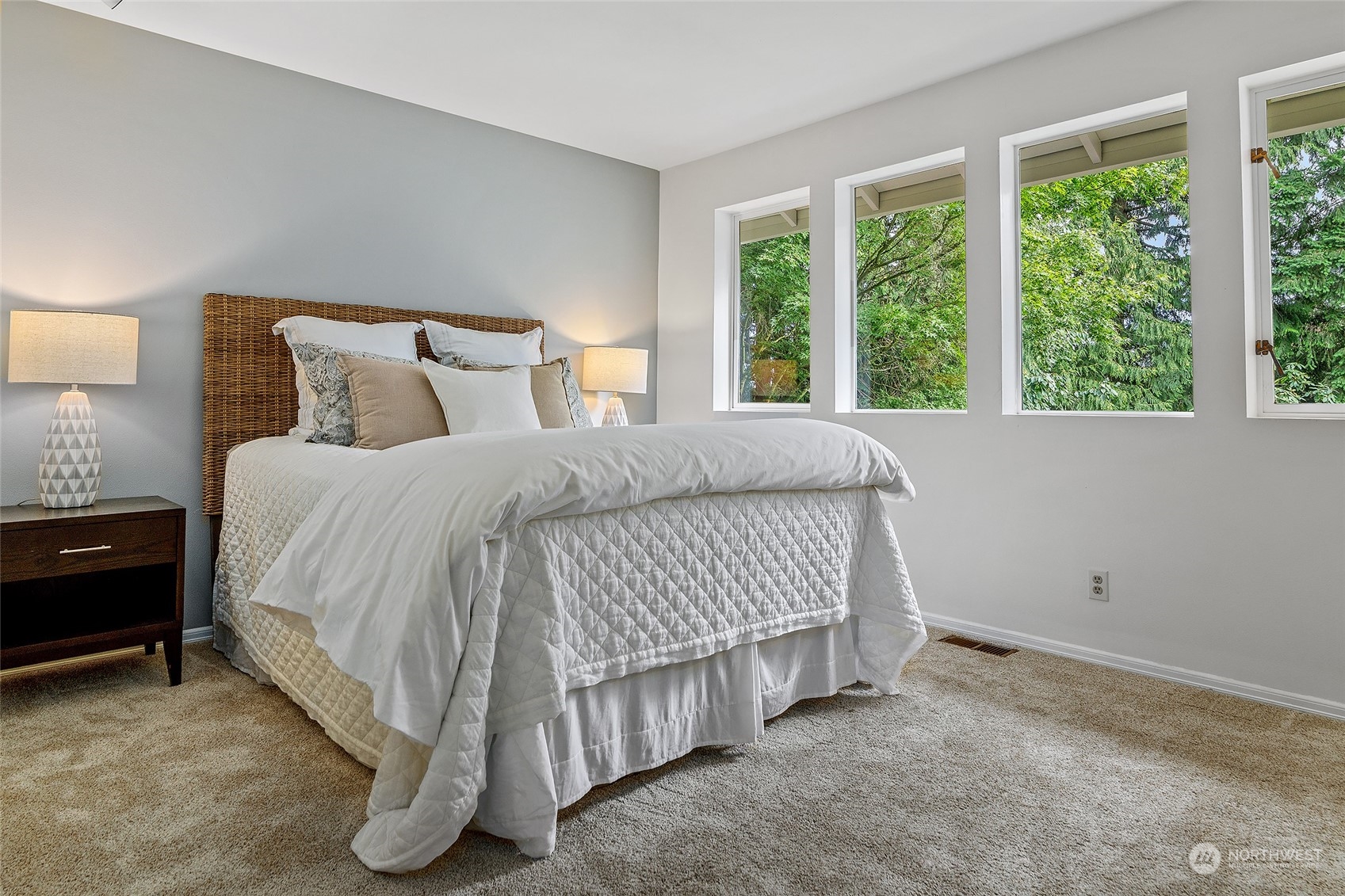 16910 3rd Avenue Southeast Bothell, WA 98012 - Photo 18 of 40 a bed sitting in a bedroom next to a window