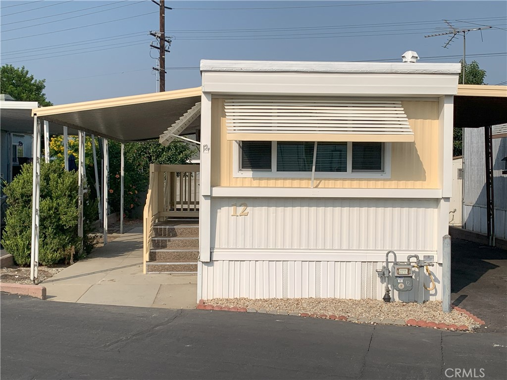 a front view of a house with a garage