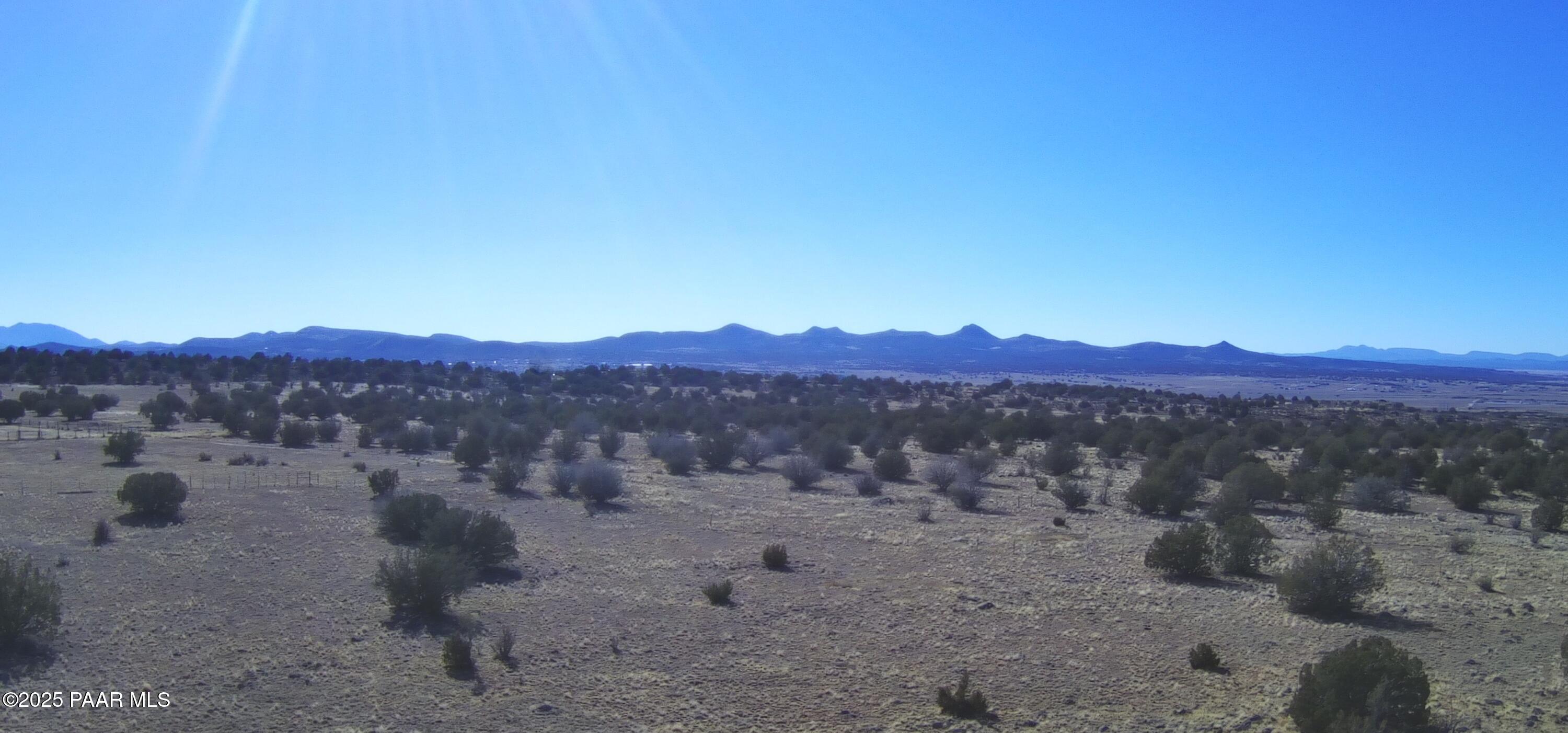 95 J North Headwaters Road Paulden, AZ 86334 - Photo 15 of 37 a view of a large mountain with a mountain in the background