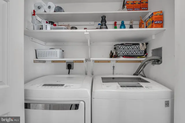 a utility room with washer and dryer