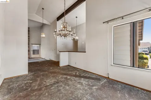 a view of a livingroom with a staircase