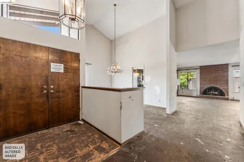 a view of an entryway with a fireplace