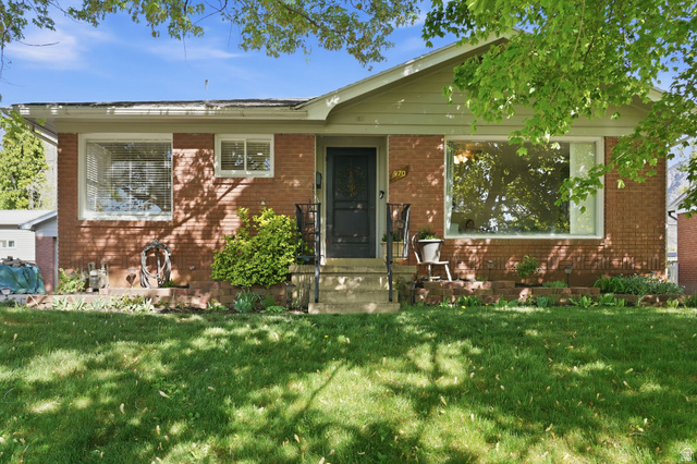 970 Tyler Avenue Ogden, UT 84404 - Photo 1 of 1 View of front of property with a front lawn and brick siding