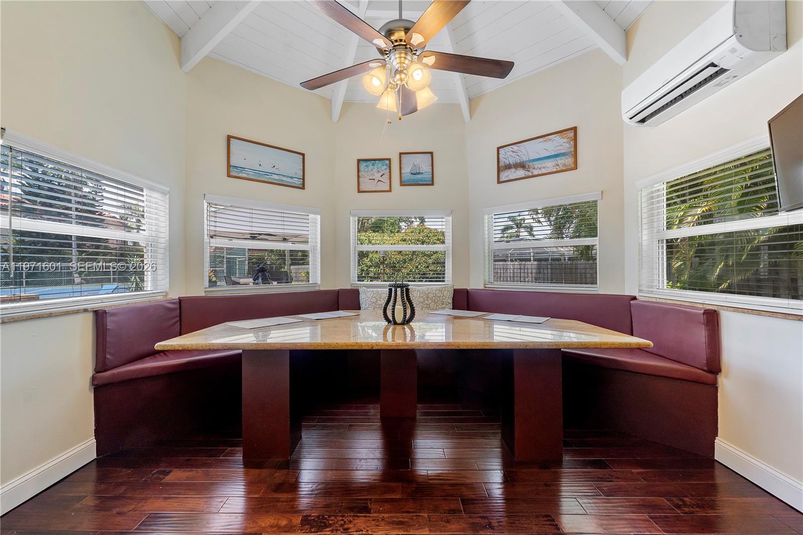 17640 Old Cutler Road Palmetto Bay, FL 33157 - Photo 15 of 56 a view of a dining room with furniture window and wooden floor