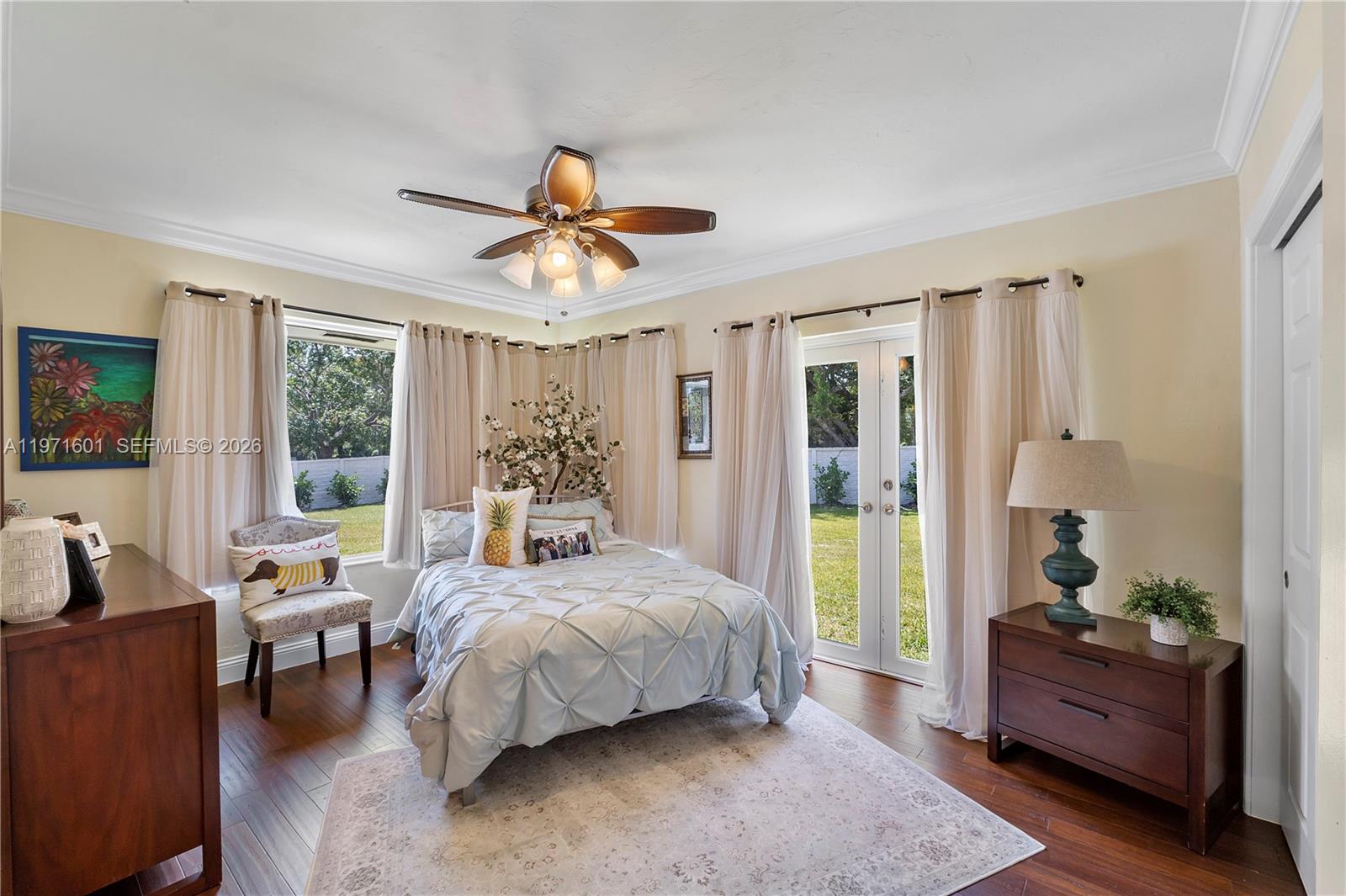 17640 Old Cutler Road Palmetto Bay, FL 33157 - Photo 25 of 56 a bed room with a bed and a couch