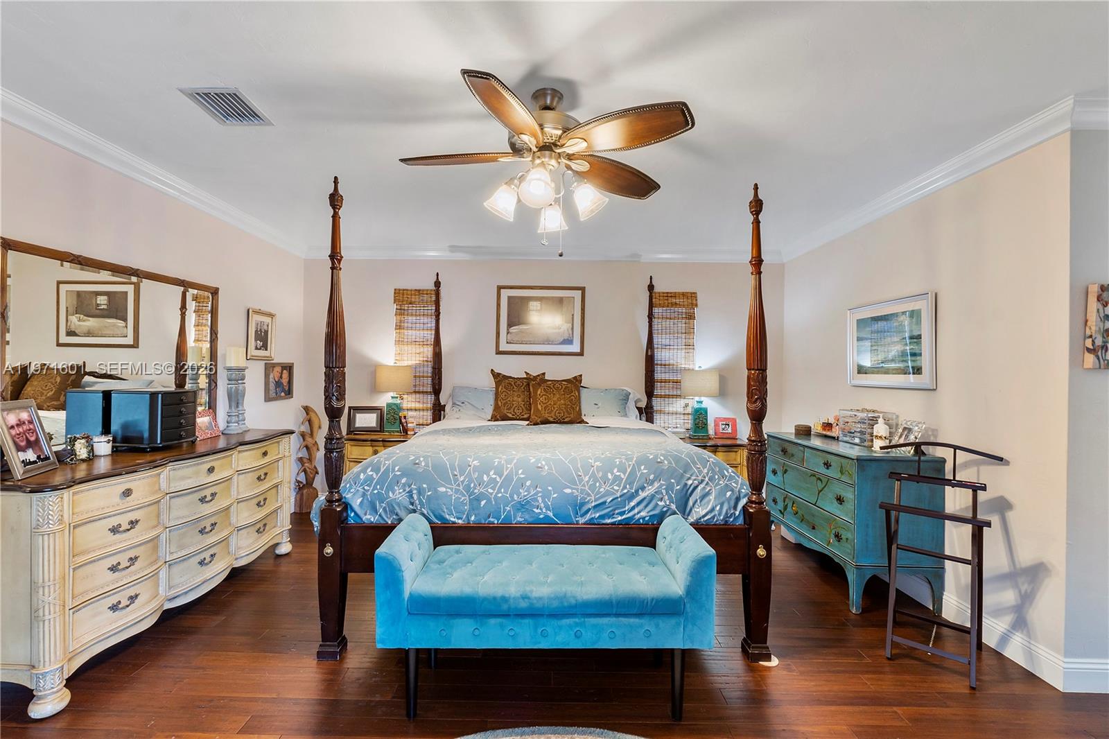 17640 Old Cutler Road Palmetto Bay, FL 33157 - Photo 29 of 56 a bed room with furniture and a chandelier