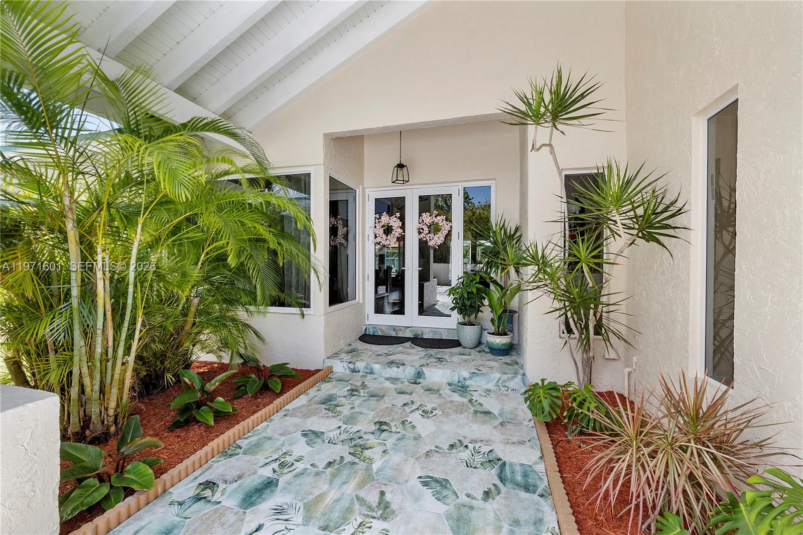 17640 Old Cutler Road Palmetto Bay, FL 33157 - Photo 3 of 56 a view of a entryway front of house