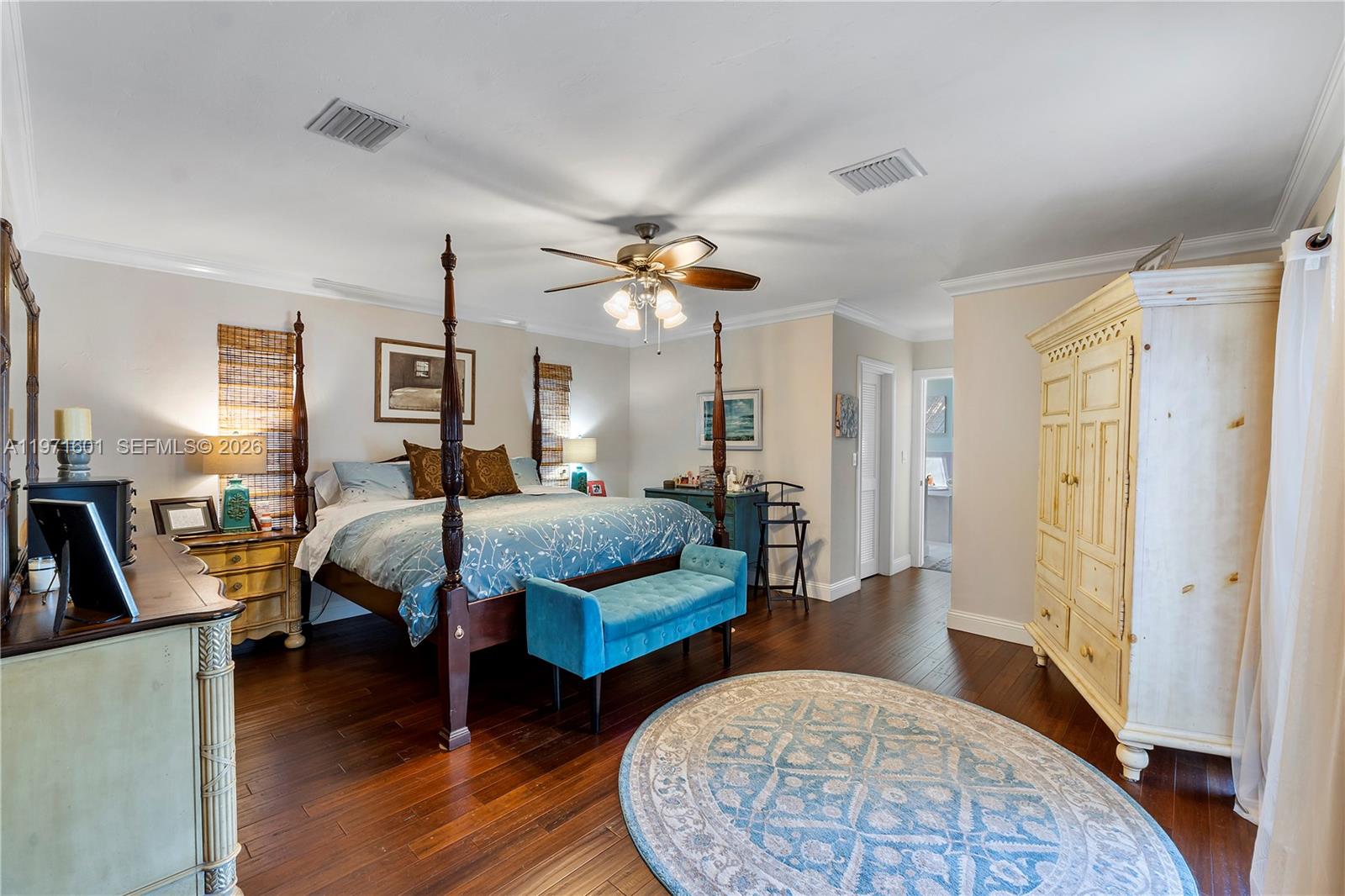 17640 Old Cutler Road Palmetto Bay, FL 33157 - Photo 31 of 56 a bedroom with bed and window